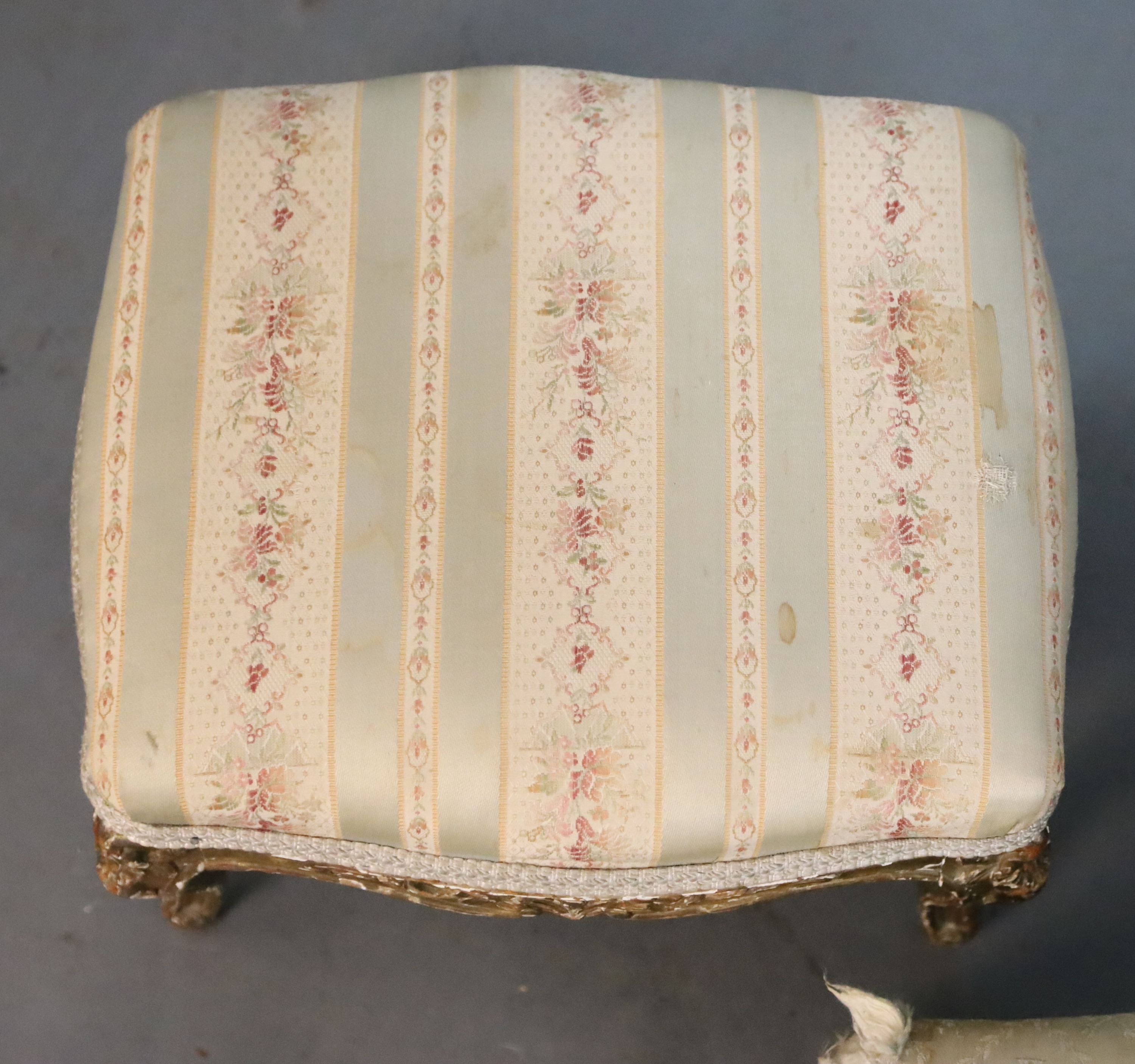 A Louis XVI style giltwood foot stool and a similar beech foot stool